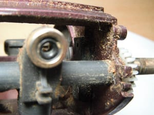 Shimano Scorpion before service — debris inside reel